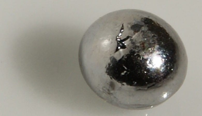 Small rhenium bead about 1.5 grams. Original size in cm